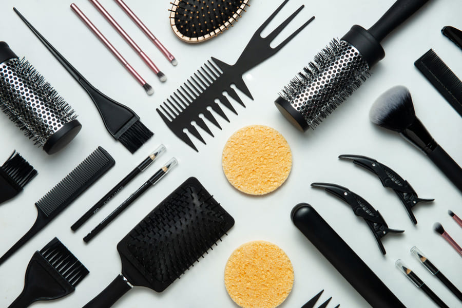 Stick Command Hooks on Cabinet Sides for Hair Tools